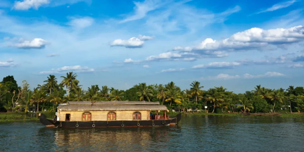 traditional houseboat floating in Kerala backwaters showcasing local culture and nature