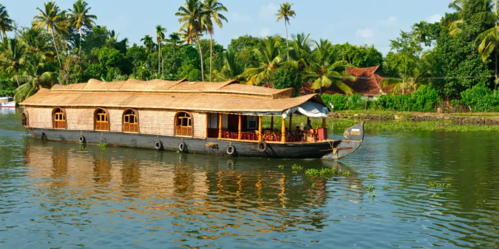 Kerala Boat House sailing peacefully on calm backwaters