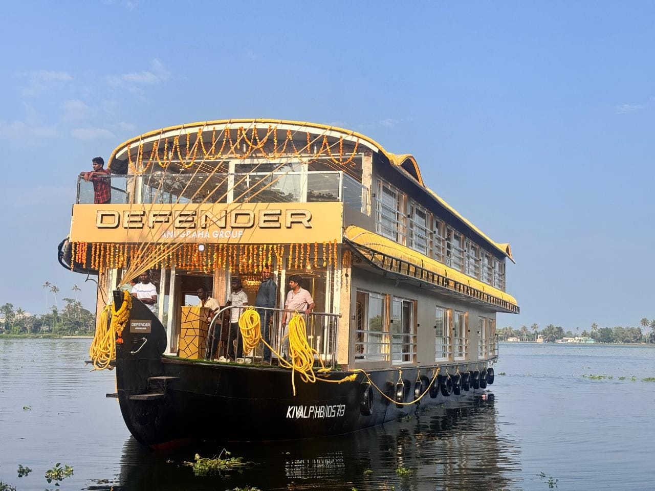 traditional houseboat floating in Kerala backwaters showcasing local culture and nature